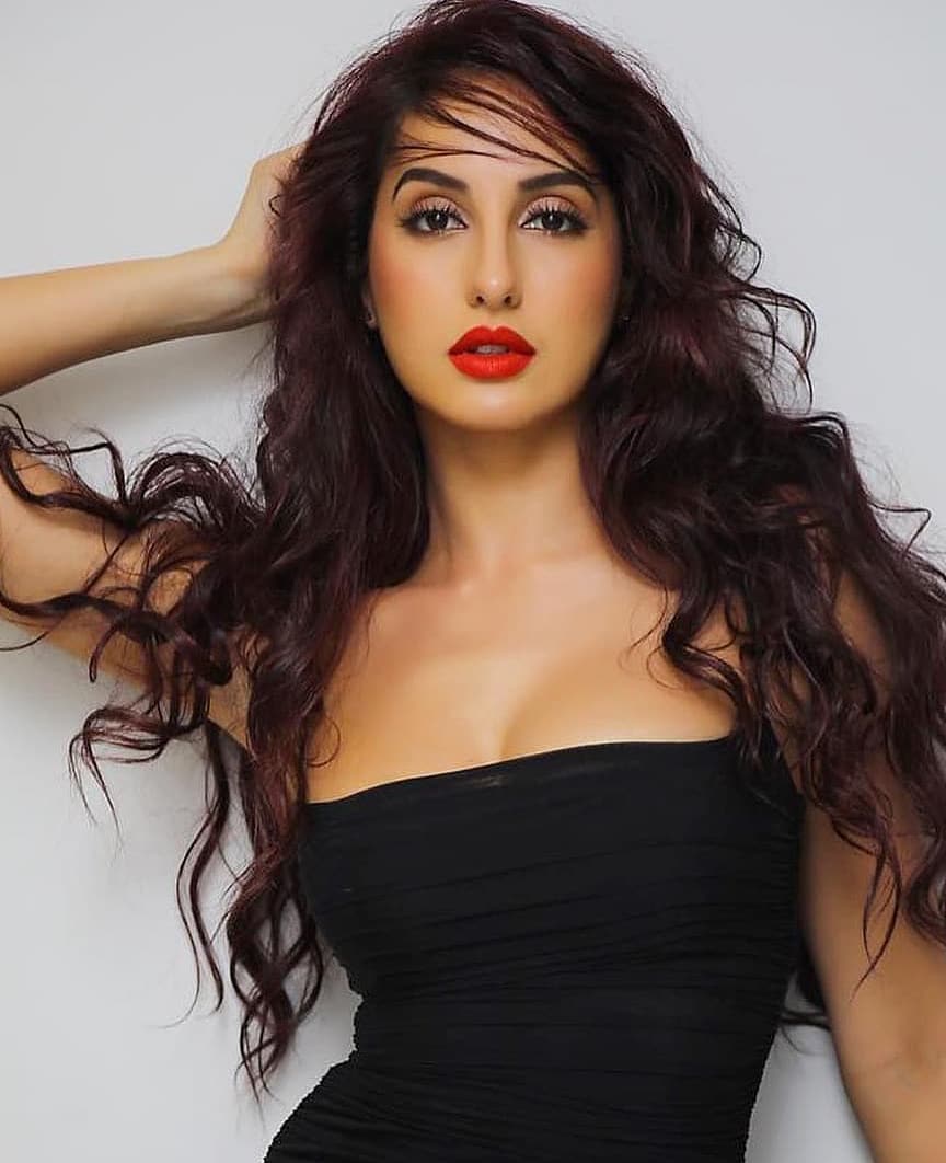 Nora Fatehi Photo Shoot In A Bright Red Lipstick