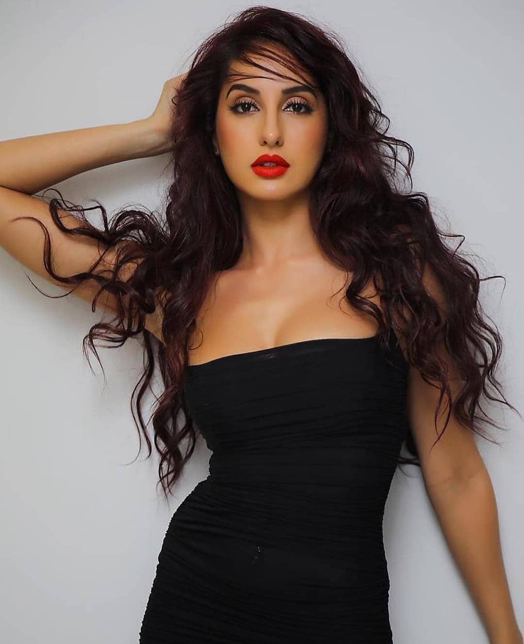 Nora Fatehi Photo Shoot In A Bright Red Lipstick