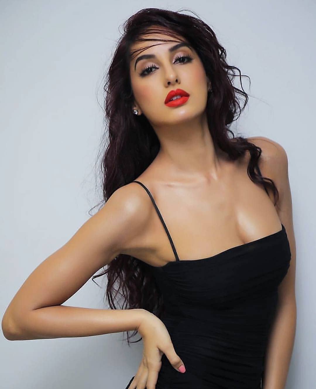 Nora Fatehi Photo Shoot In A Bright Red Lipstick