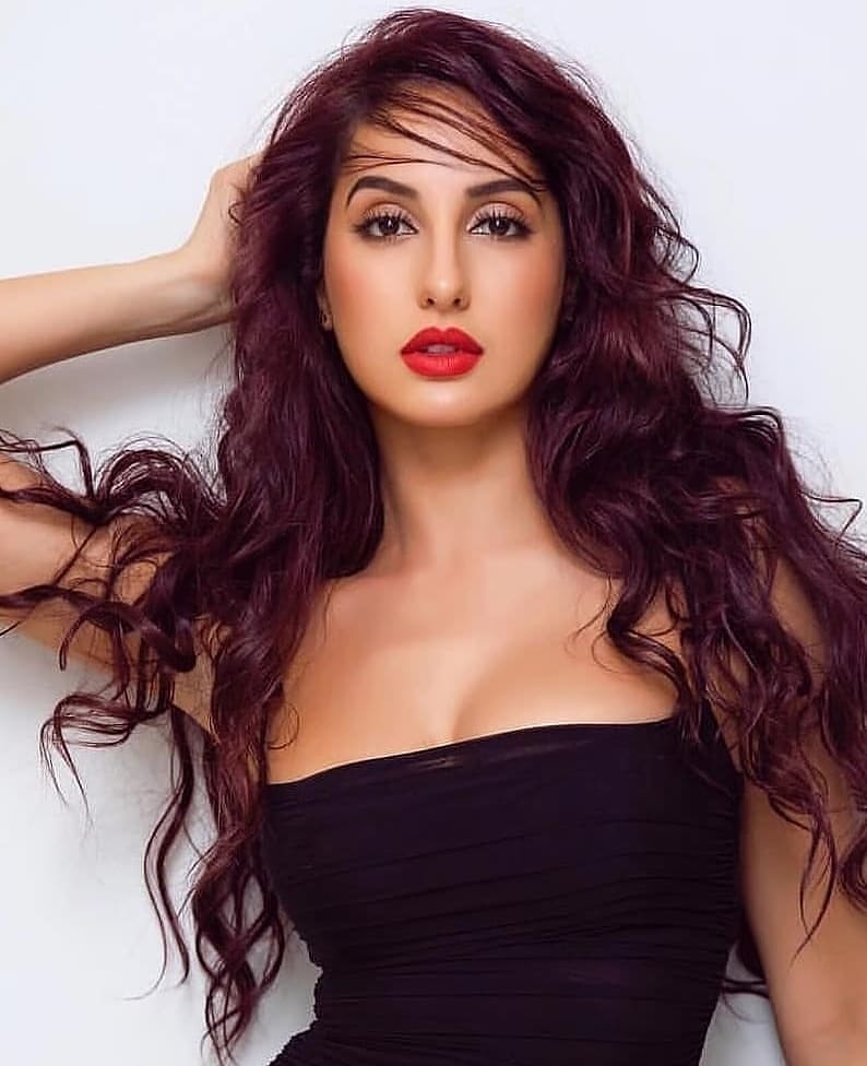 Nora Fatehi Photo Shoot In A Bright Red Lipstick