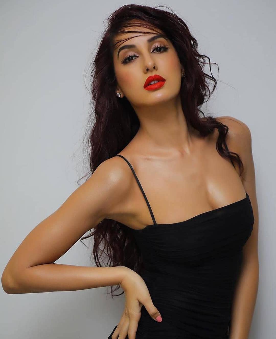 Nora Fatehi Photo Shoot In A Bright Red Lipstick
