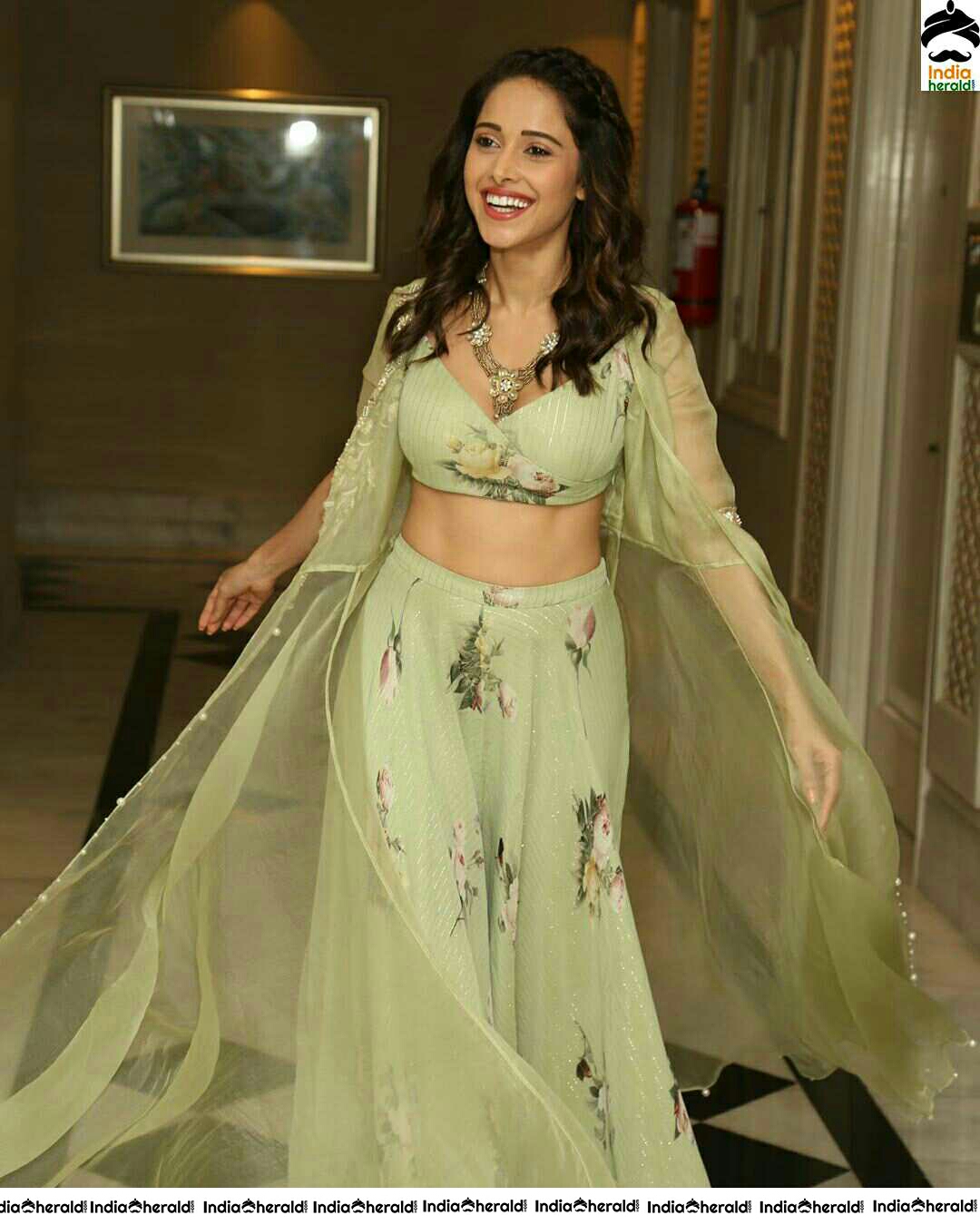 Nushrat Bharucha Shows Her Sexy Waist Line In Green Attire