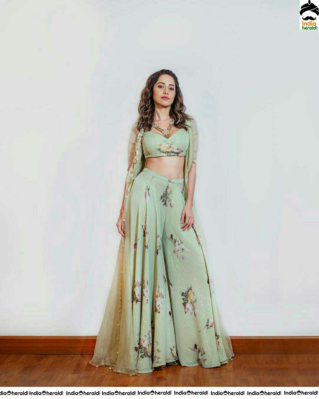 Nushrat Bharucha Shows Her Sexy Waist Line In Green Attire