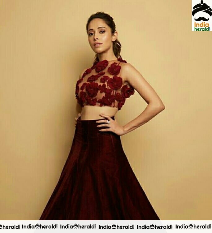 Nushrat Shows her tiny waistline and teases us