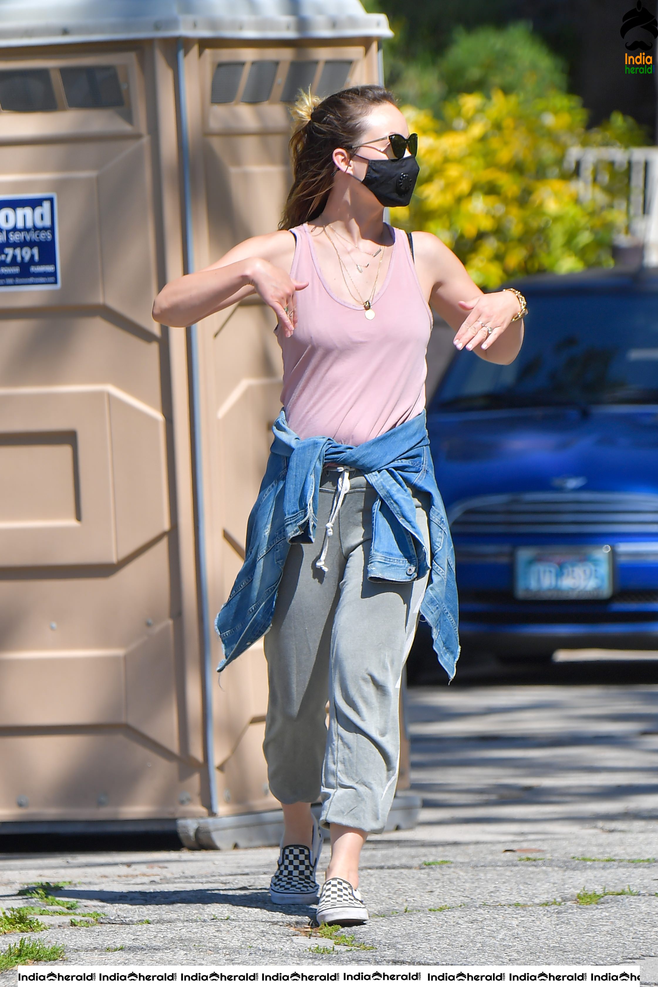 Olivia Wilde caught by Paparazzi with masks when out for a walk in Santa Monica