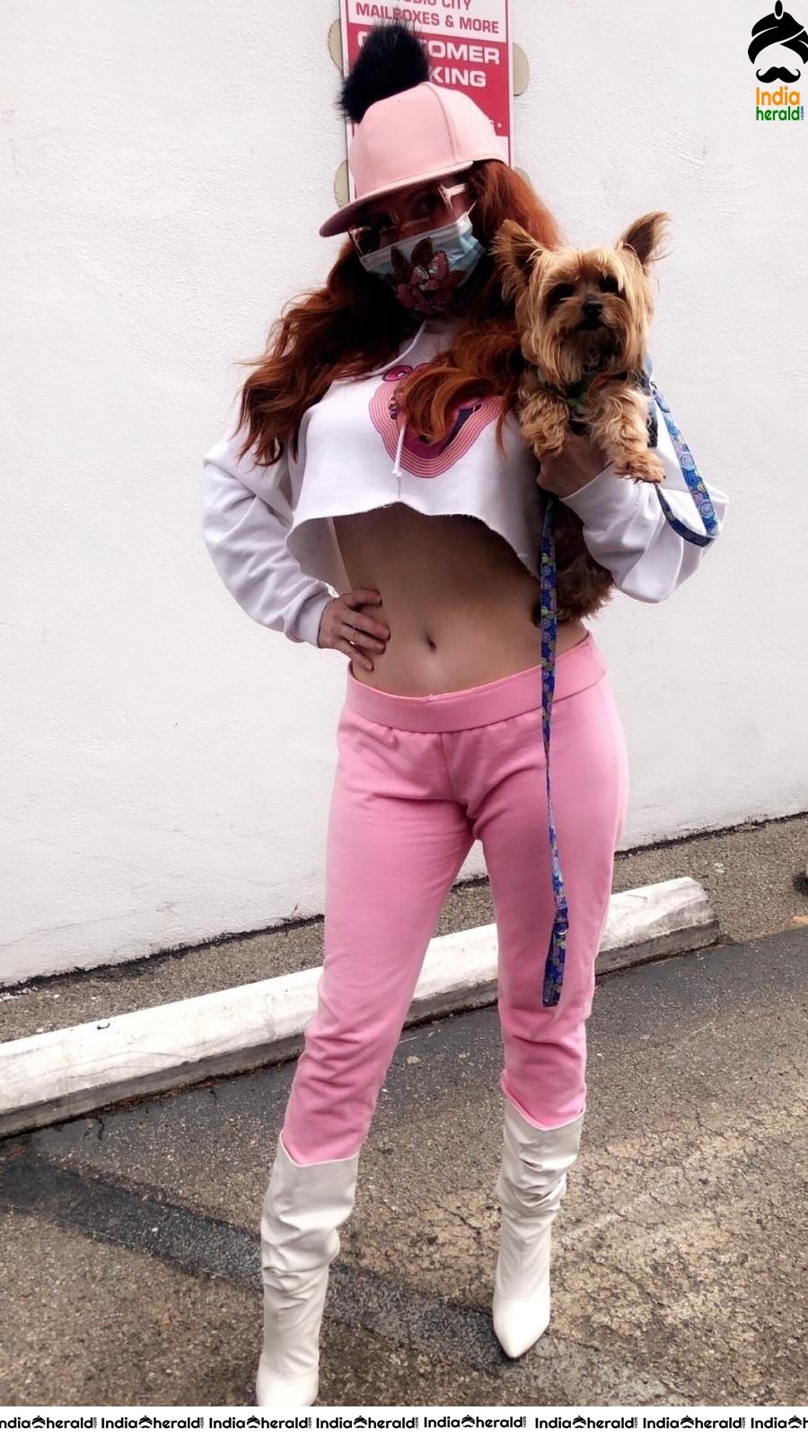 Phoebe Price shows her midriff and wears a mask due to Corona in West Hollywood