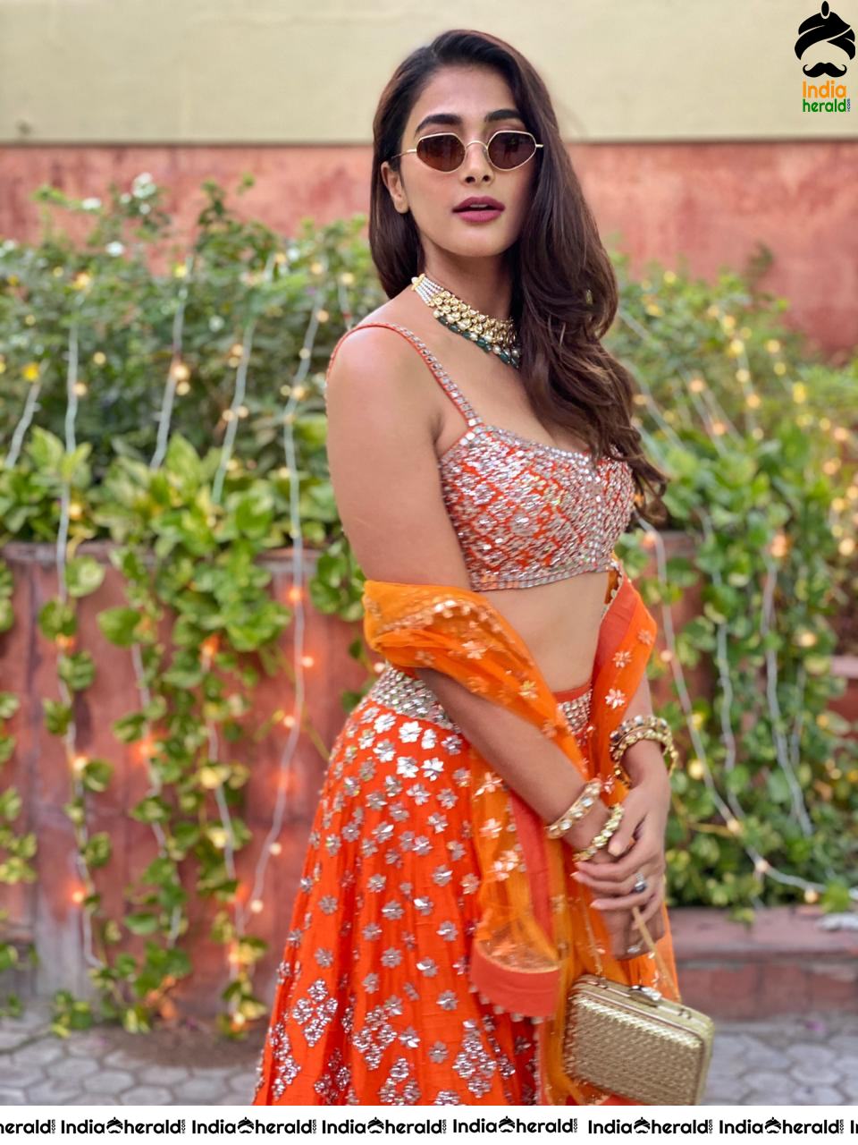 Pooja Hegde shows her teasing Waistline in Sleeveless Blouse and Long Skirt at a Function