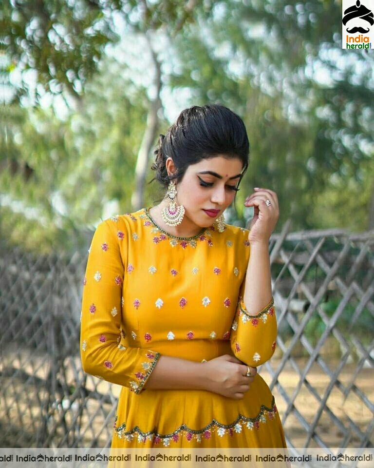 Poorna Cute Latest Yellow Dress Stills