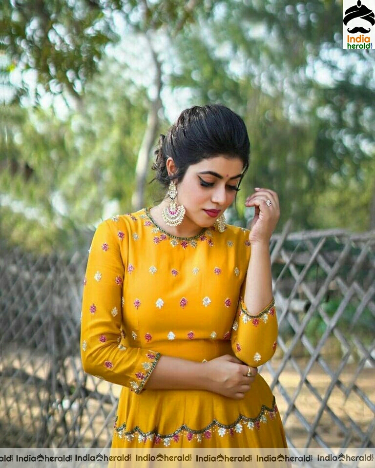 Poorna Cute Latest Yellow Dress Stills