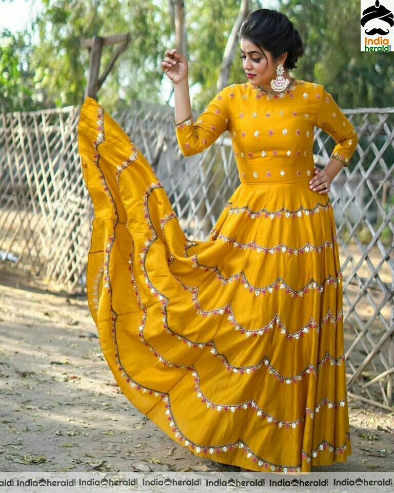 Poorna Cute Latest Yellow Dress Stills