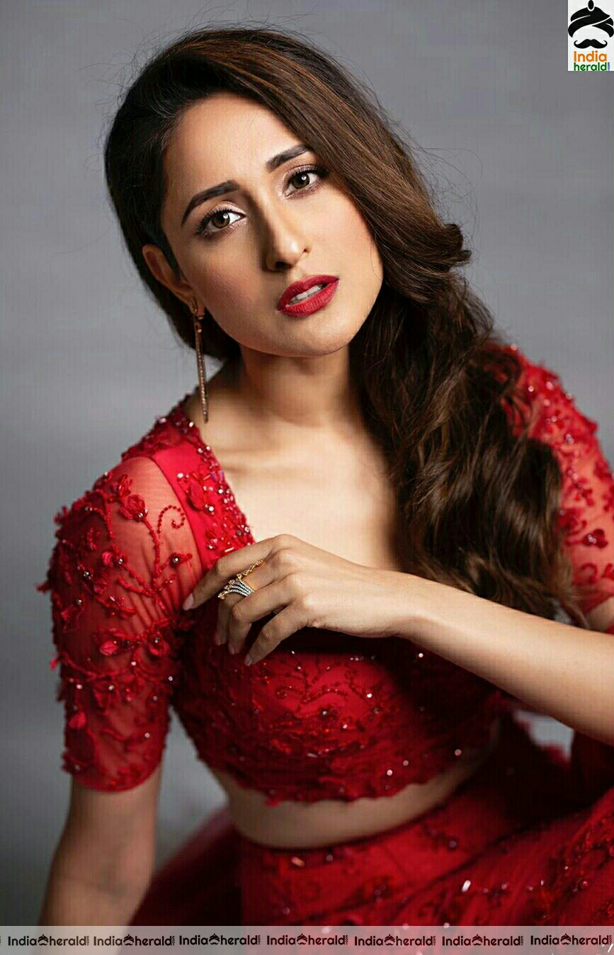 Pragya Jaiswal Hot In Red Dress Stills