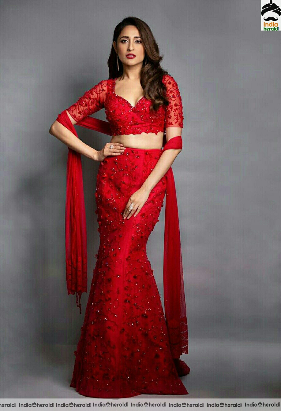 Pragya Jaiswal Hot In Red Dress Stills