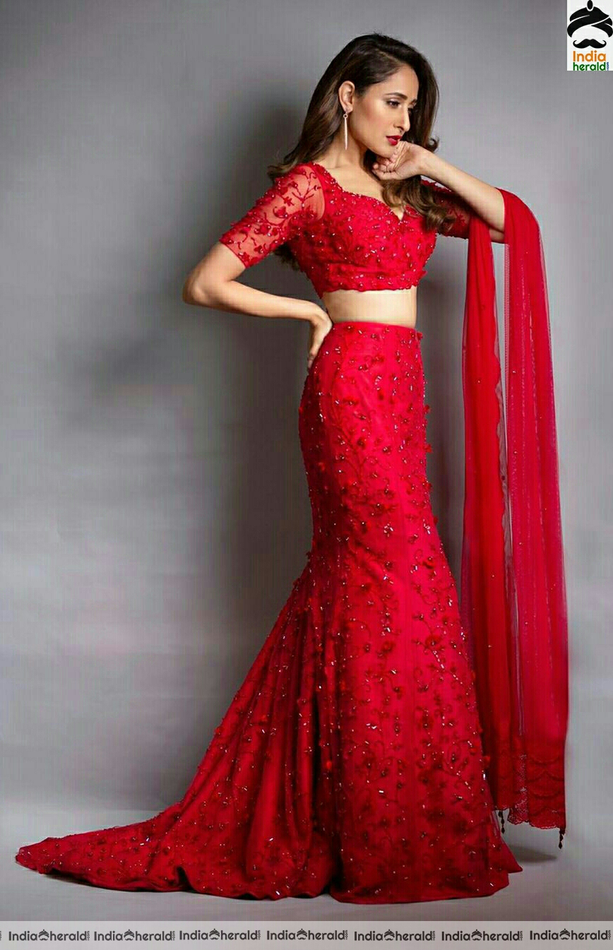 Pragya Jaiswal Hot In Red Dress Stills
