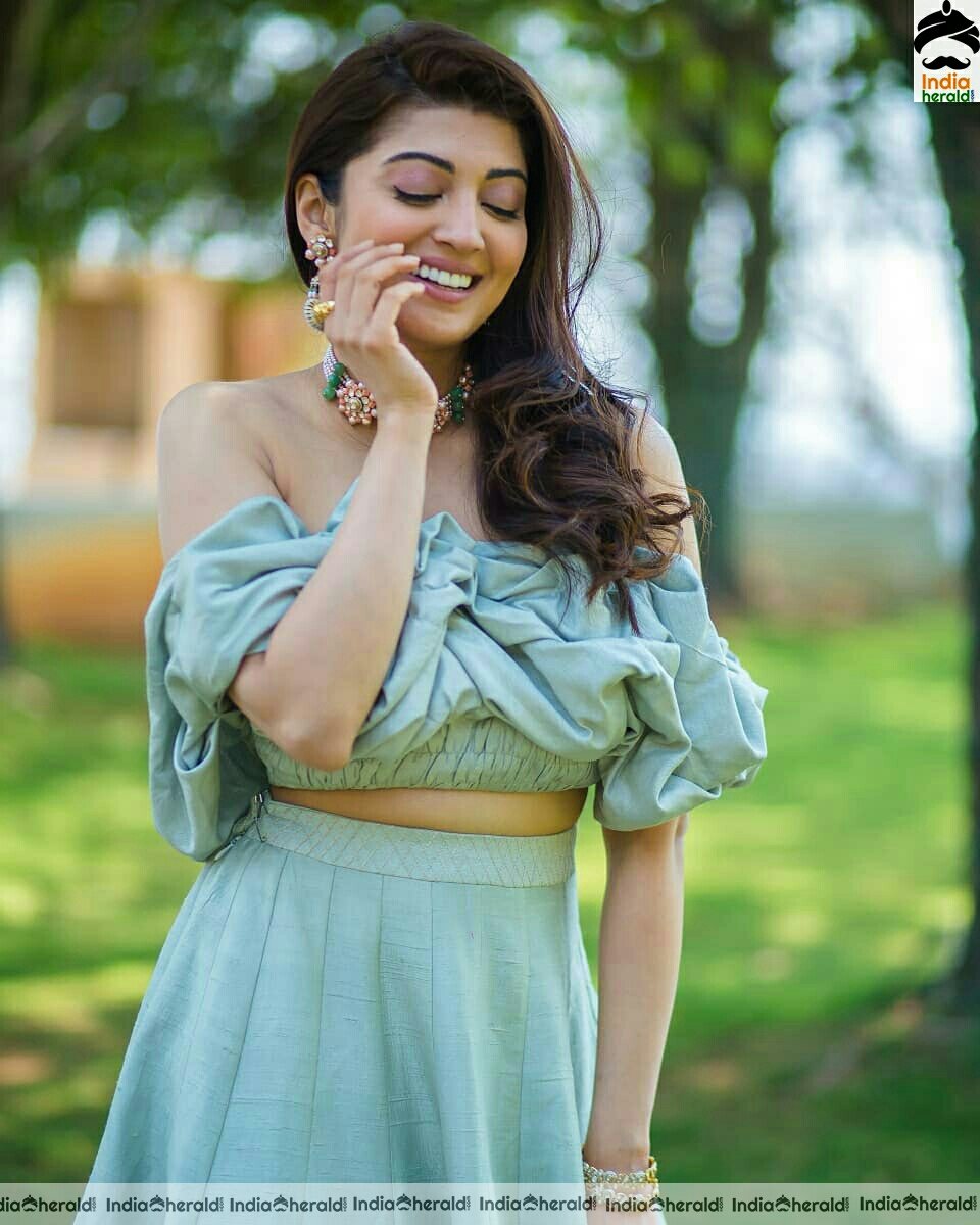 Pranitha Hot Latest Green Tubeless Dress Stills