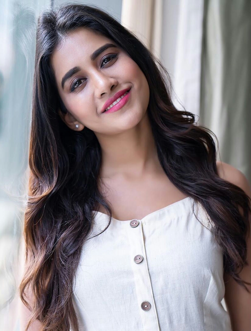 Pretty Babe Nabha In White Dazzling Dress