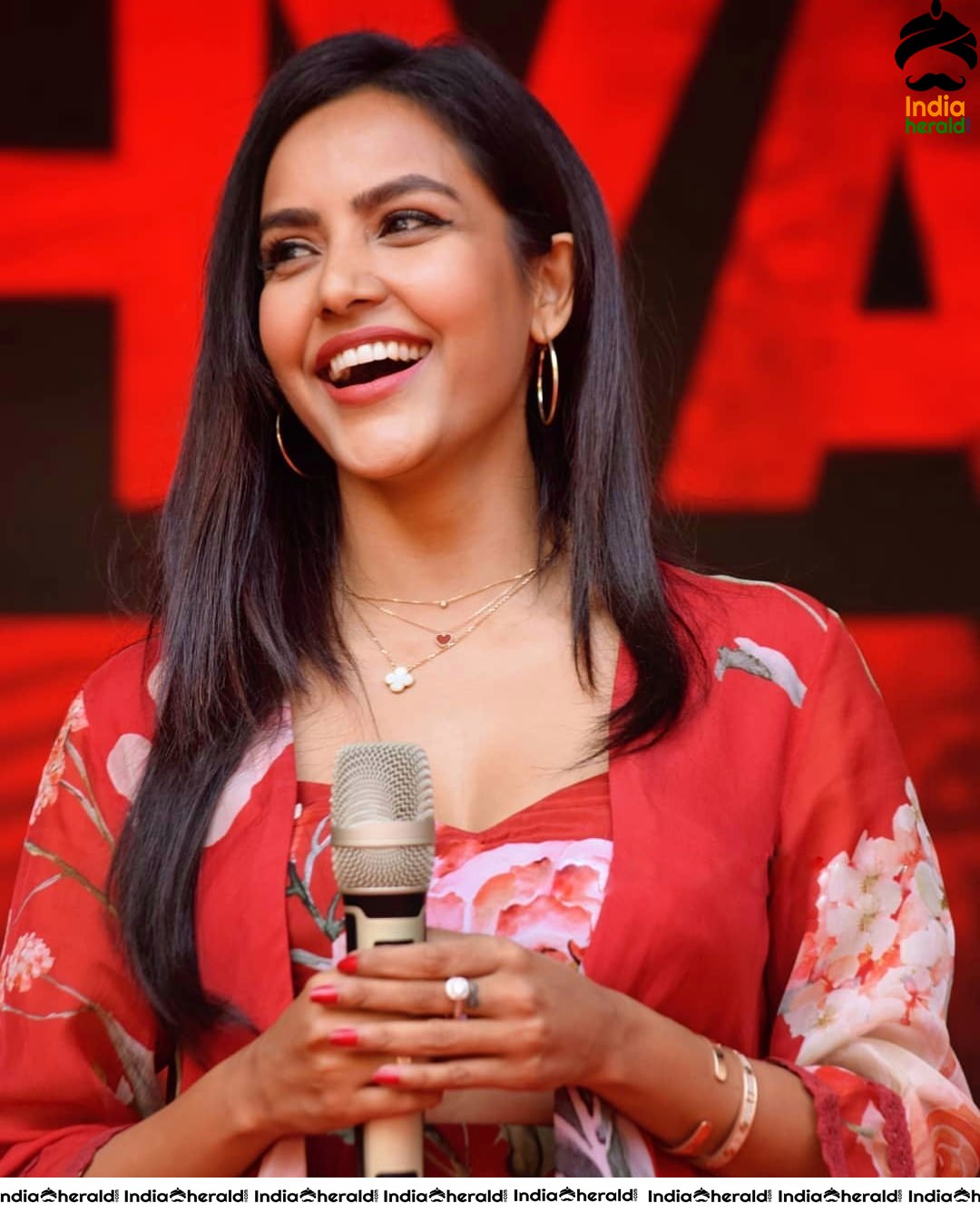 Priya Anand Red Hot Photos exposing Cleavage and Waistline in Aditya Varma Press Meet