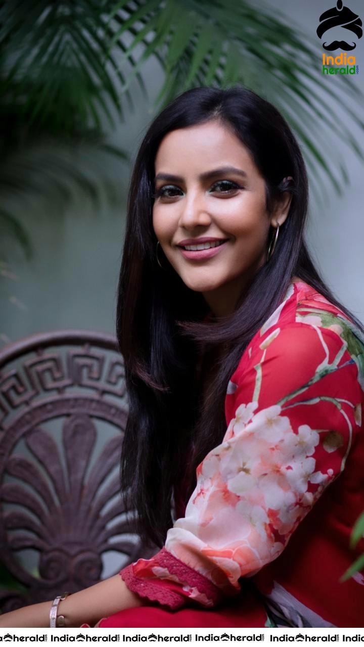 Priya Anand Red Hot Photos exposing Cleavage and Waistline in Aditya Varma Press Meet