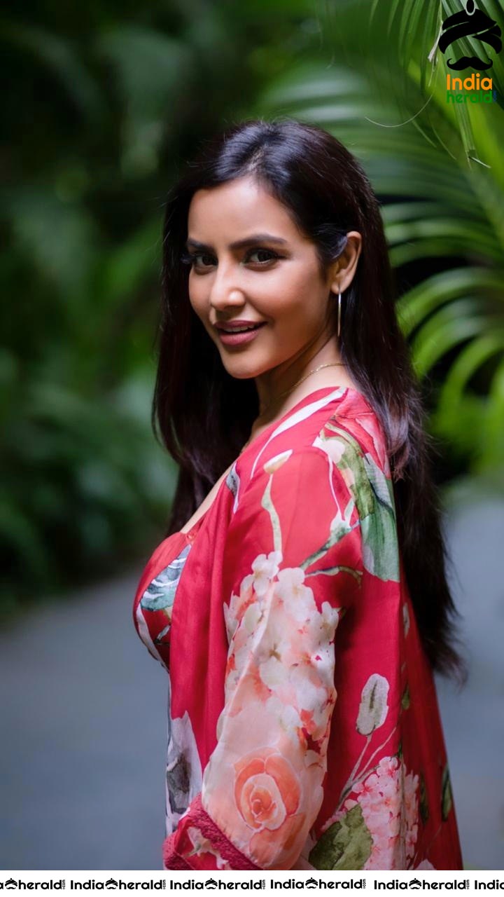 Priya Anand Red Hot Photos exposing Cleavage and Waistline in Aditya Varma Press Meet