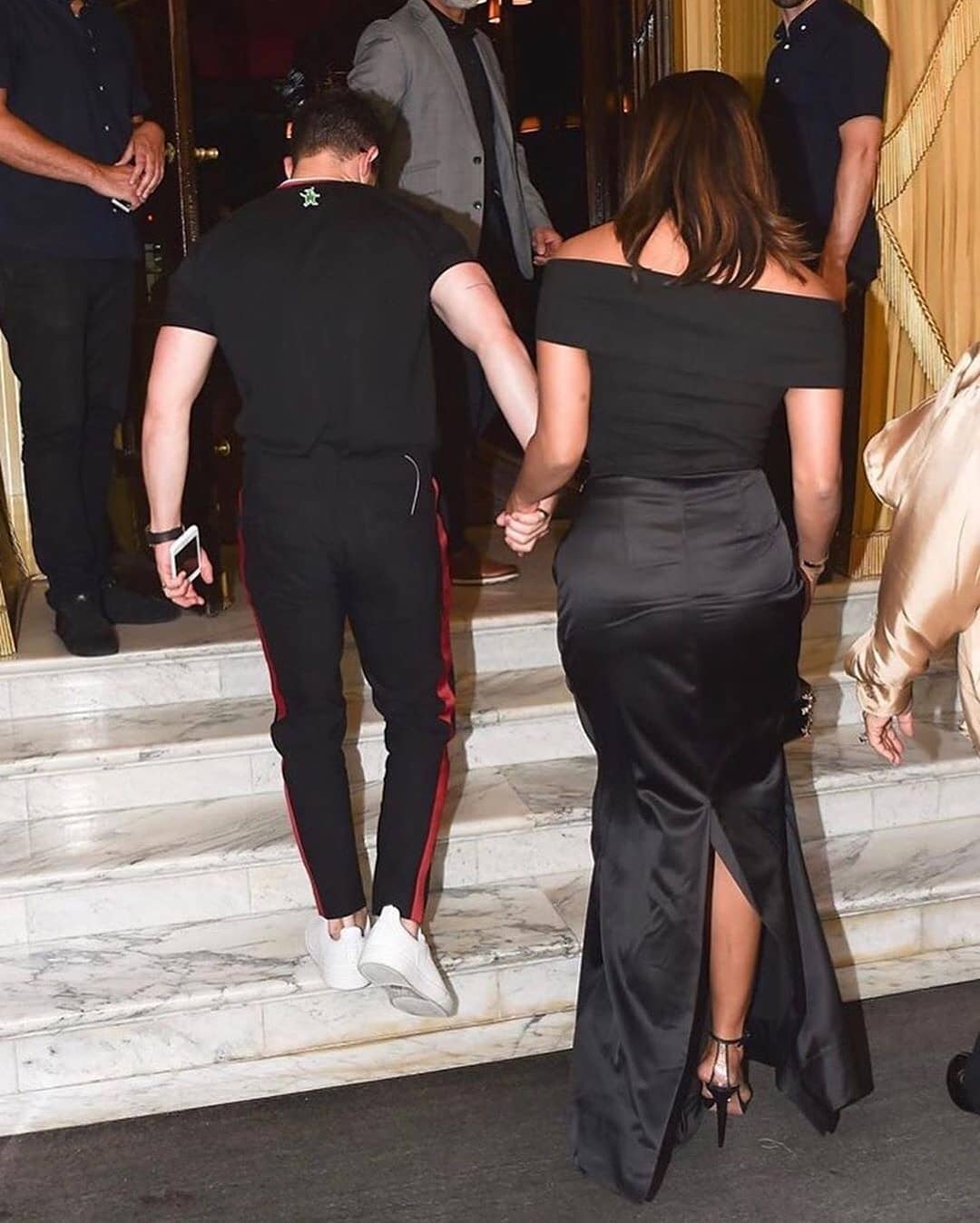 Priyanka Chopra And Her Husband Dressed In Dashing Black Dress
