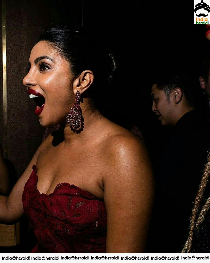 Priyanka Chopra Hot Cleavage Show In A Red Net Maxi Dress Set 1