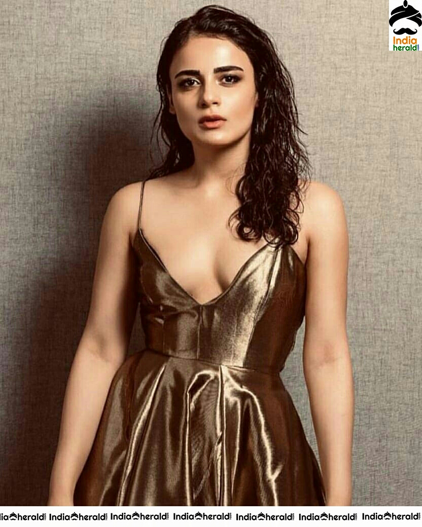 Radhika Madan Super Cleavage Sexy Hot In Gold Sleeveless Frock Photoshoot