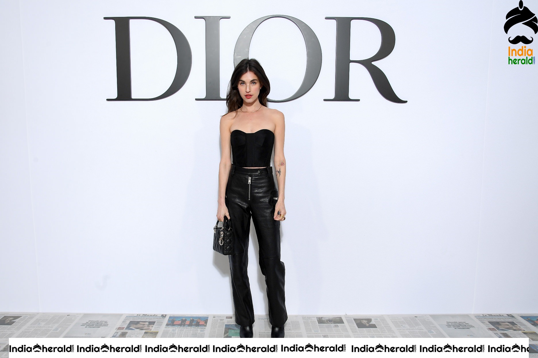 Rainey Qualley in Dior show at Paris Fashion Week