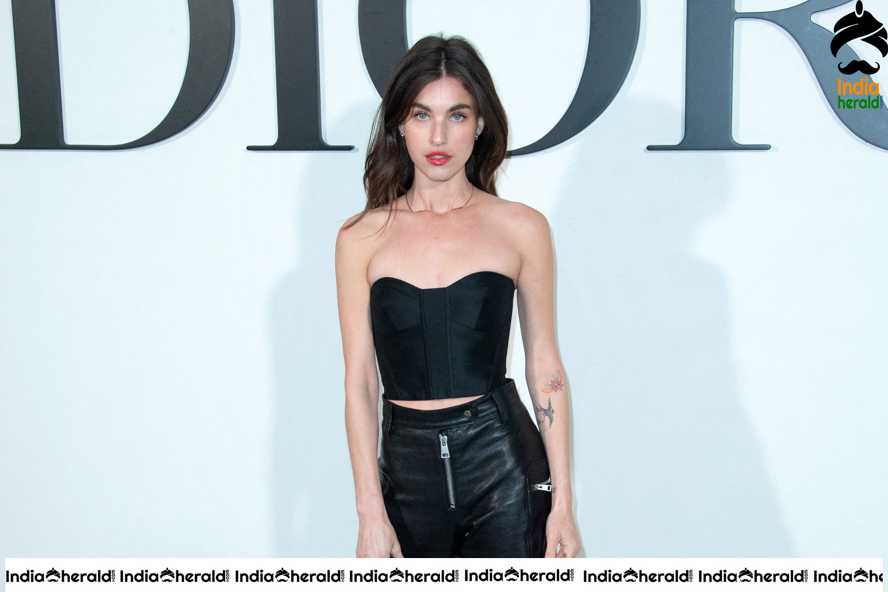 Rainey Qualley in Dior show at Paris Fashion Week