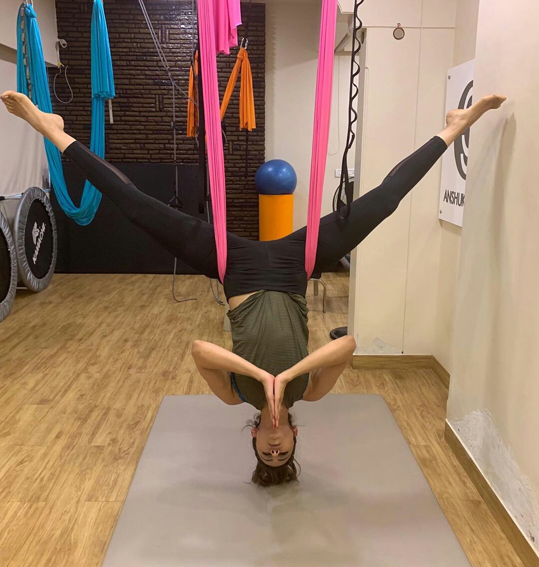 Rakul Preet Flexes Her Muscles While Duing Yoga