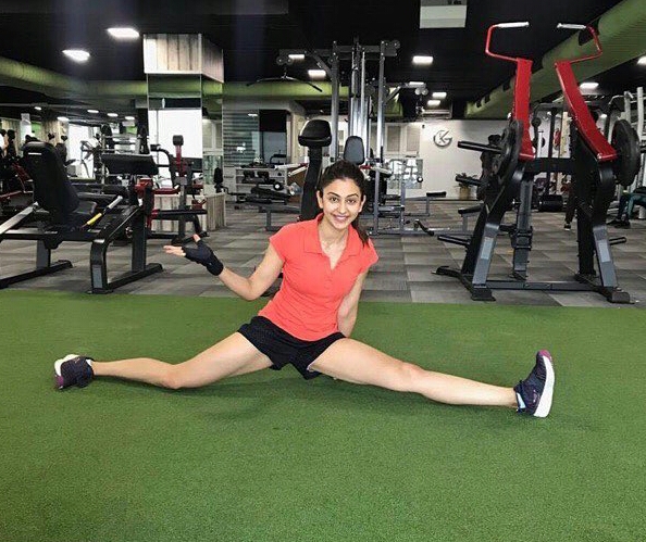 Rakul Preet Flexes Her Muscles While Duing Yoga