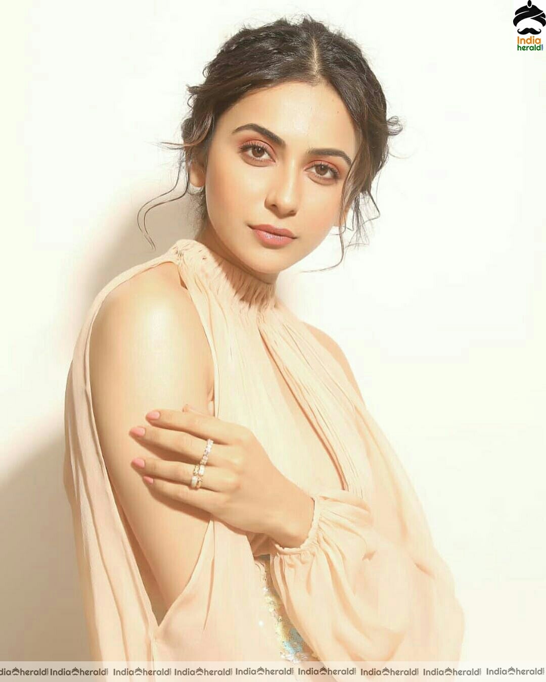 Rakul Preet Hot In Golden dress stills