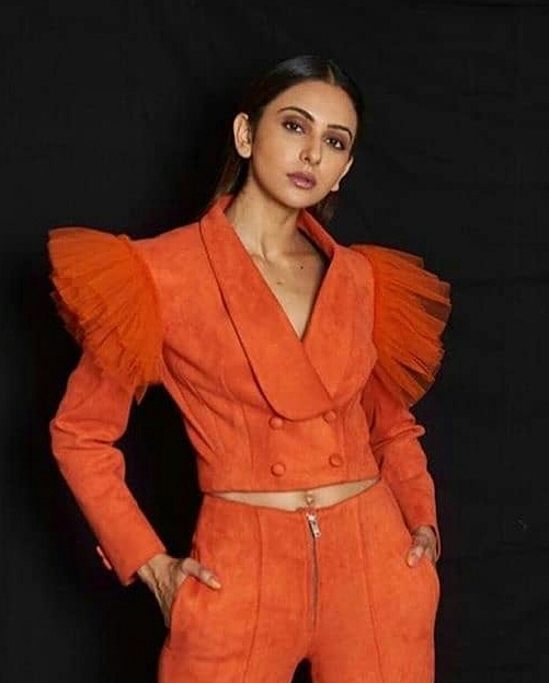 Rakul Preet Hot In Orange Photo Shoot