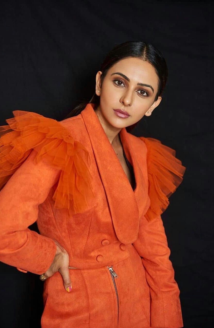 Rakul Preet Hot In Orange Photo Shoot