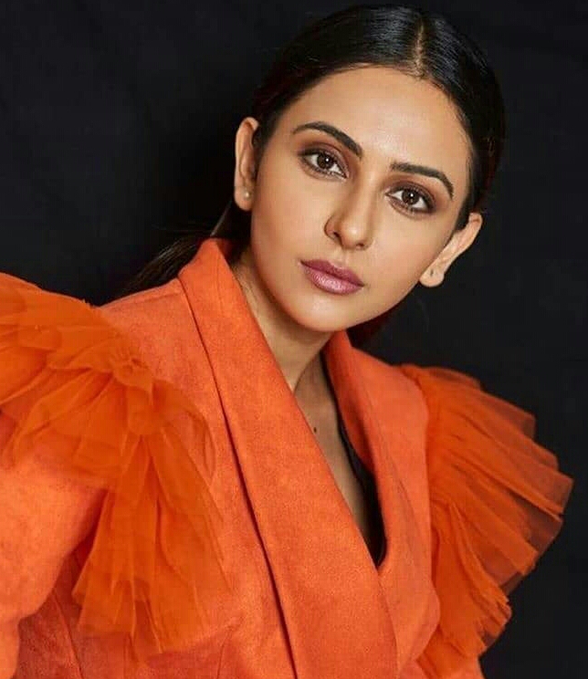 Rakul Preet Hot In Orange Photo Shoot