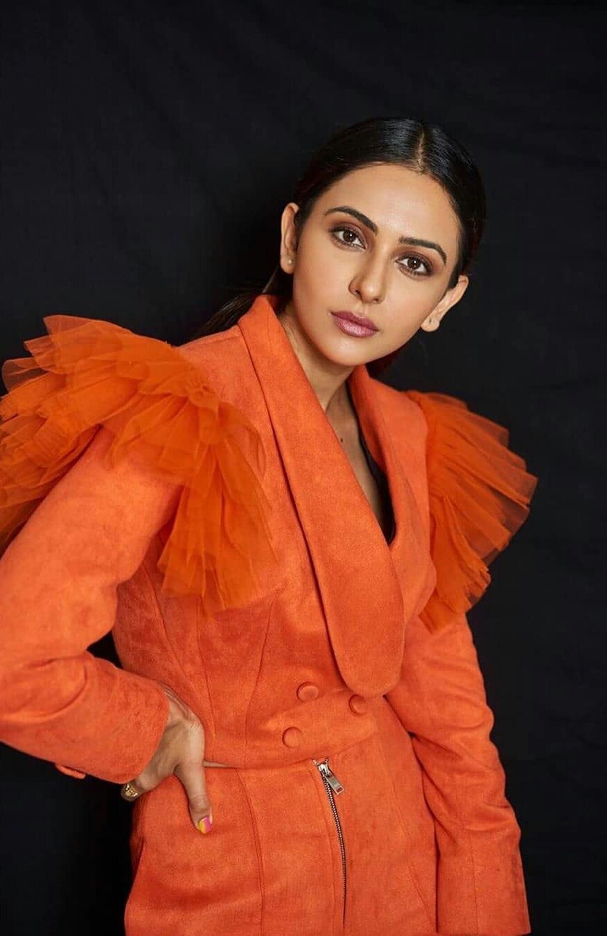 Rakul Preet Hot In Orange Photo Shoot
