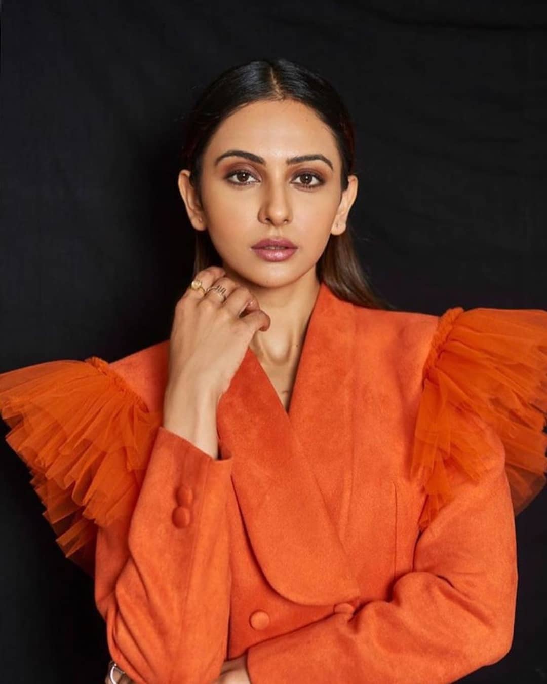 Rakul Preet Hot In Orange Photo Shoot