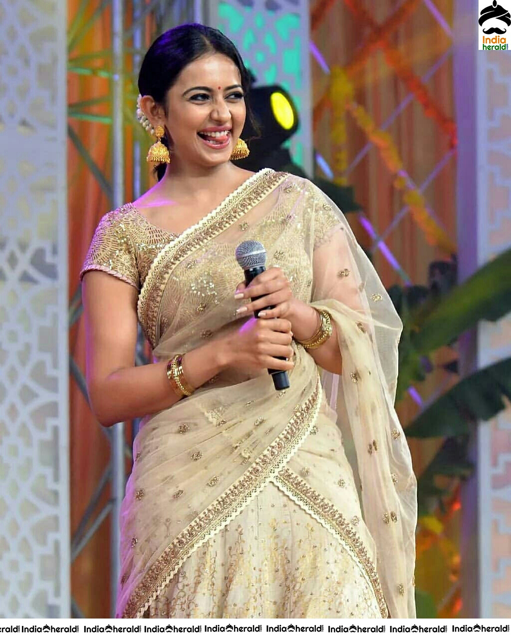 Rakul Preet Hot In Transparent Gold Net Saree