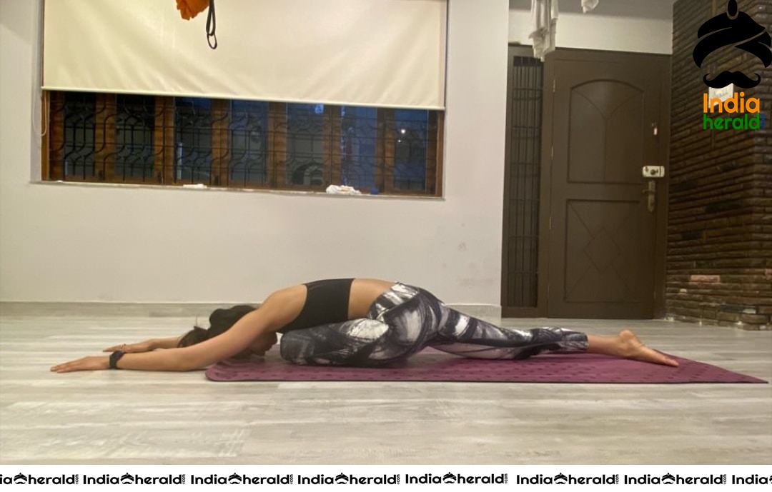 Rakul Preet Performing Hot Yoga at her Home and she flaunts Cleavage