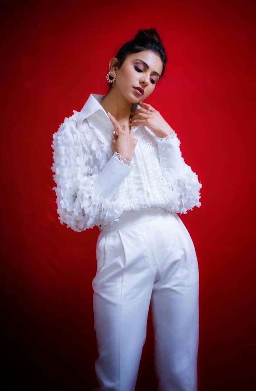 Rakul Preet Shines In White During Red Background Shoot