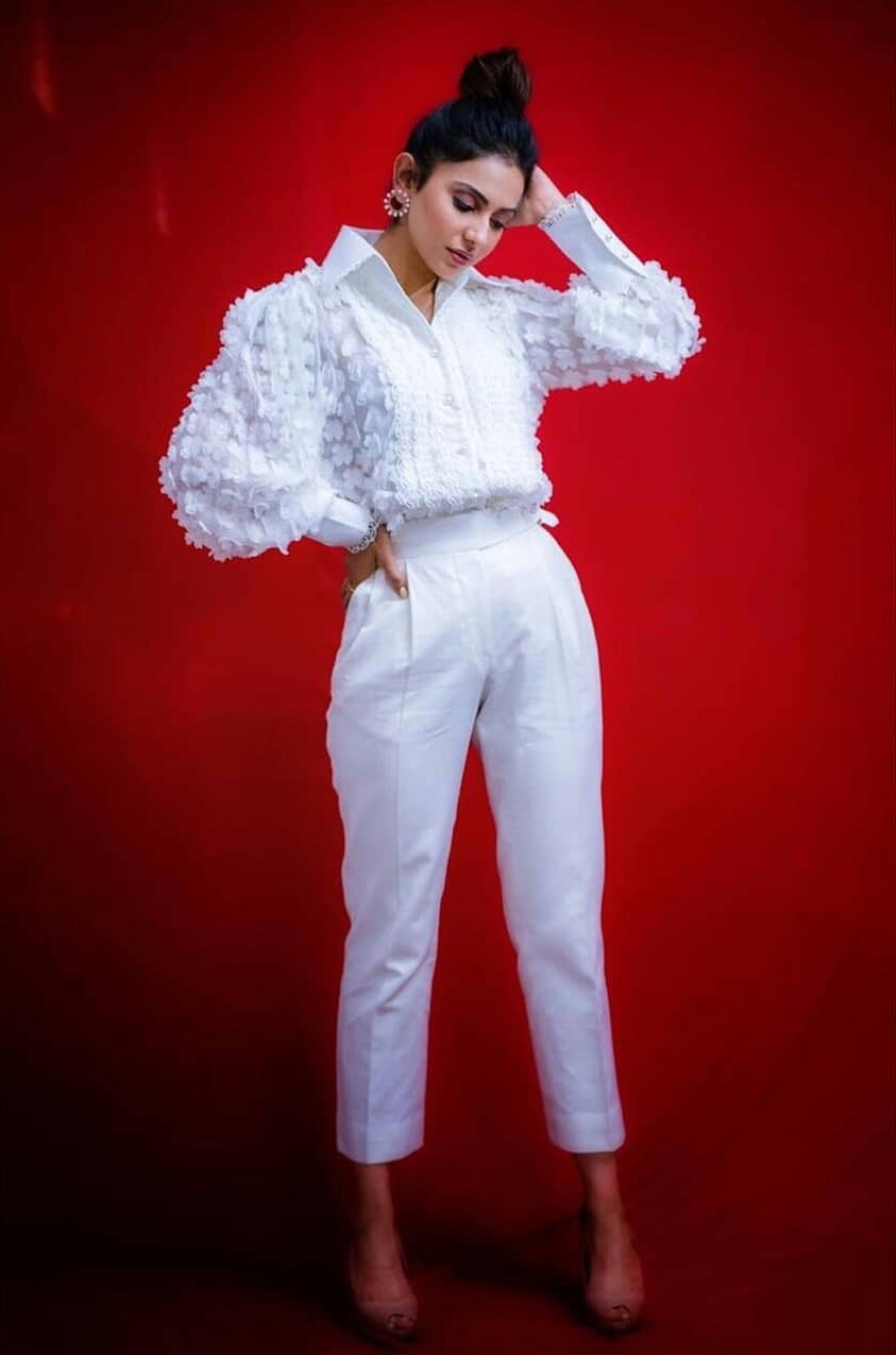 Rakul Preet Shines In White During Red Background Shoot
