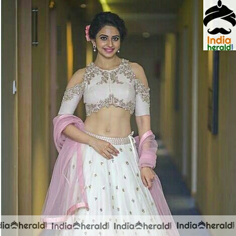 Rakul Preet showing her milky midriff and tempting navel in these hot photos