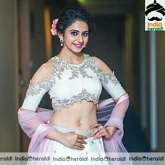 Rakul Preet showing her milky midriff and tempting navel in these hot photos