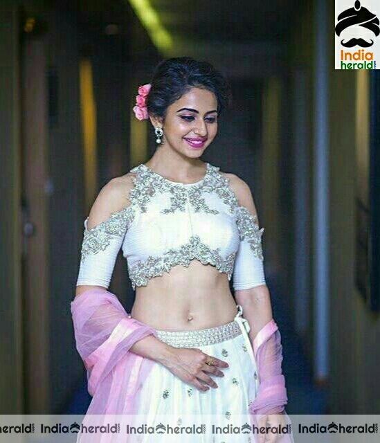Rakul Preet showing her milky midriff and tempting navel in these hot photos