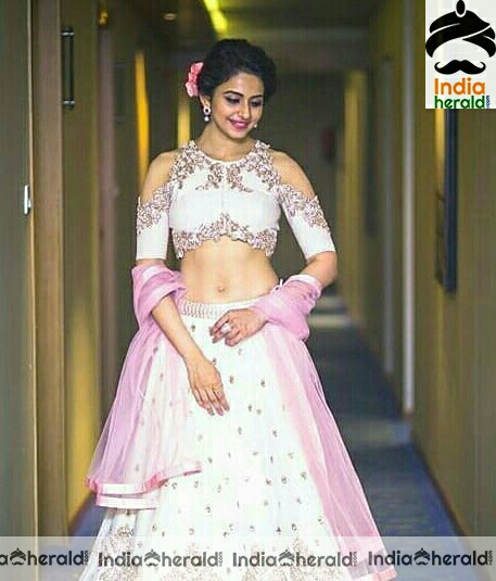 Rakul Preet showing her milky midriff and tempting navel in these hot photos