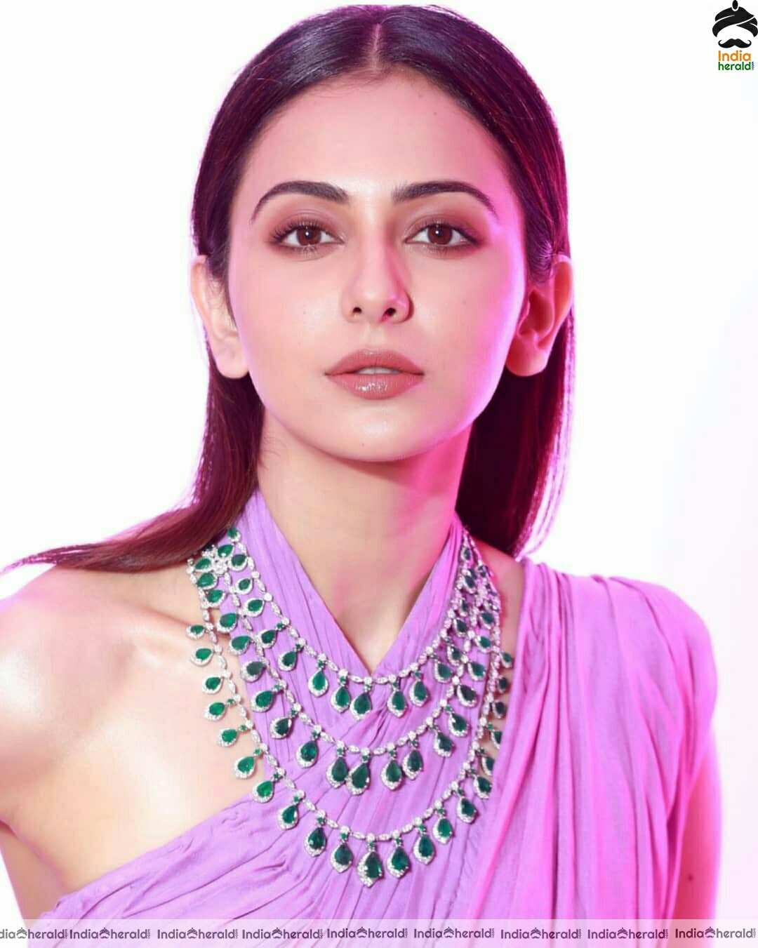 Rakul Preet Shows Her Hot Sexy Waist In Purple Saree Stills