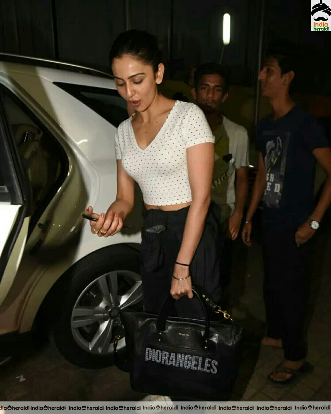 Rakulpreet Hot In White Short Tight Top while Spotted Outside juhu