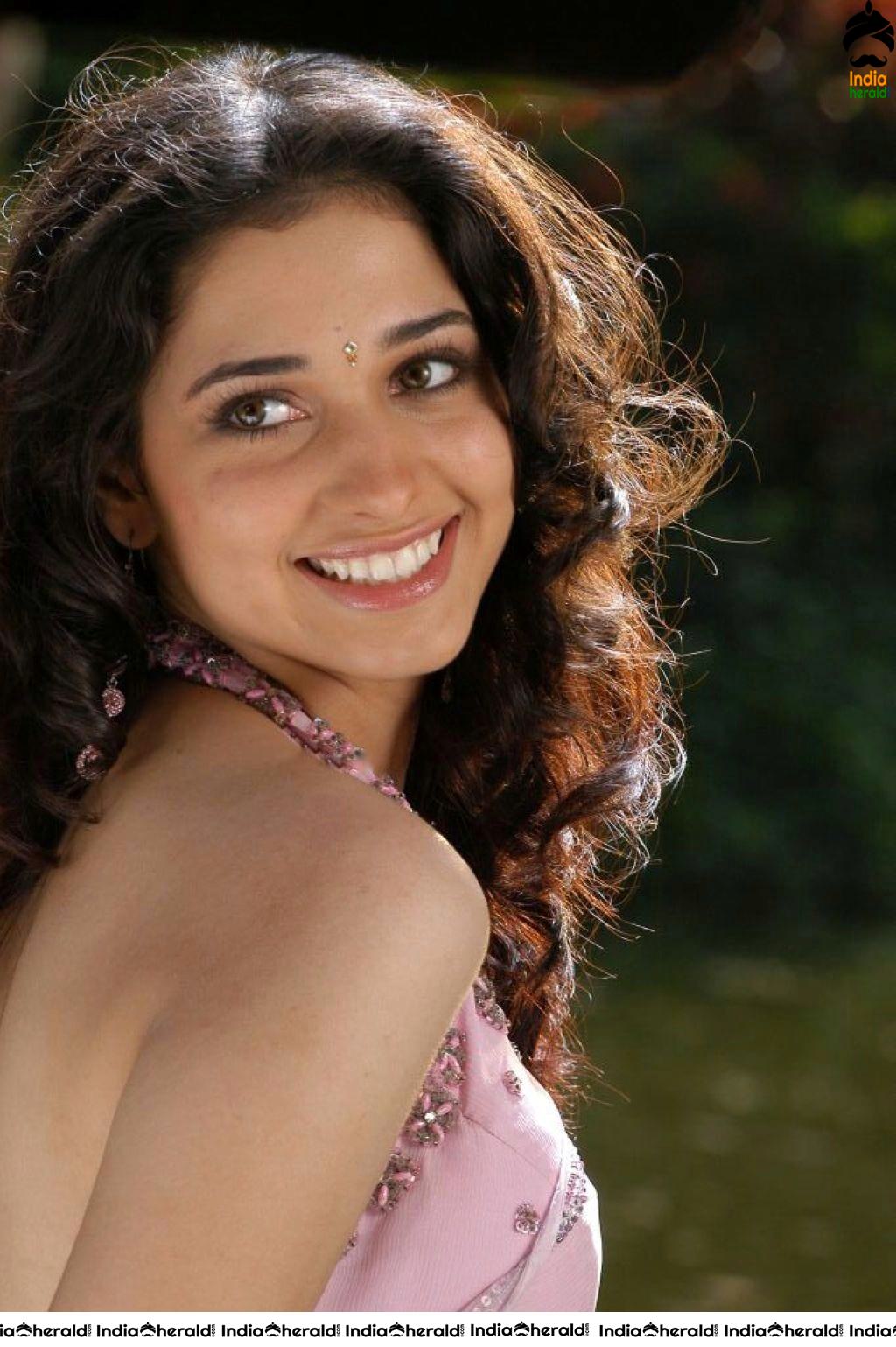 Rare Hot Photos of Tamannaah Saree Stripping and Enjoyed by Hero under Rain Set 1