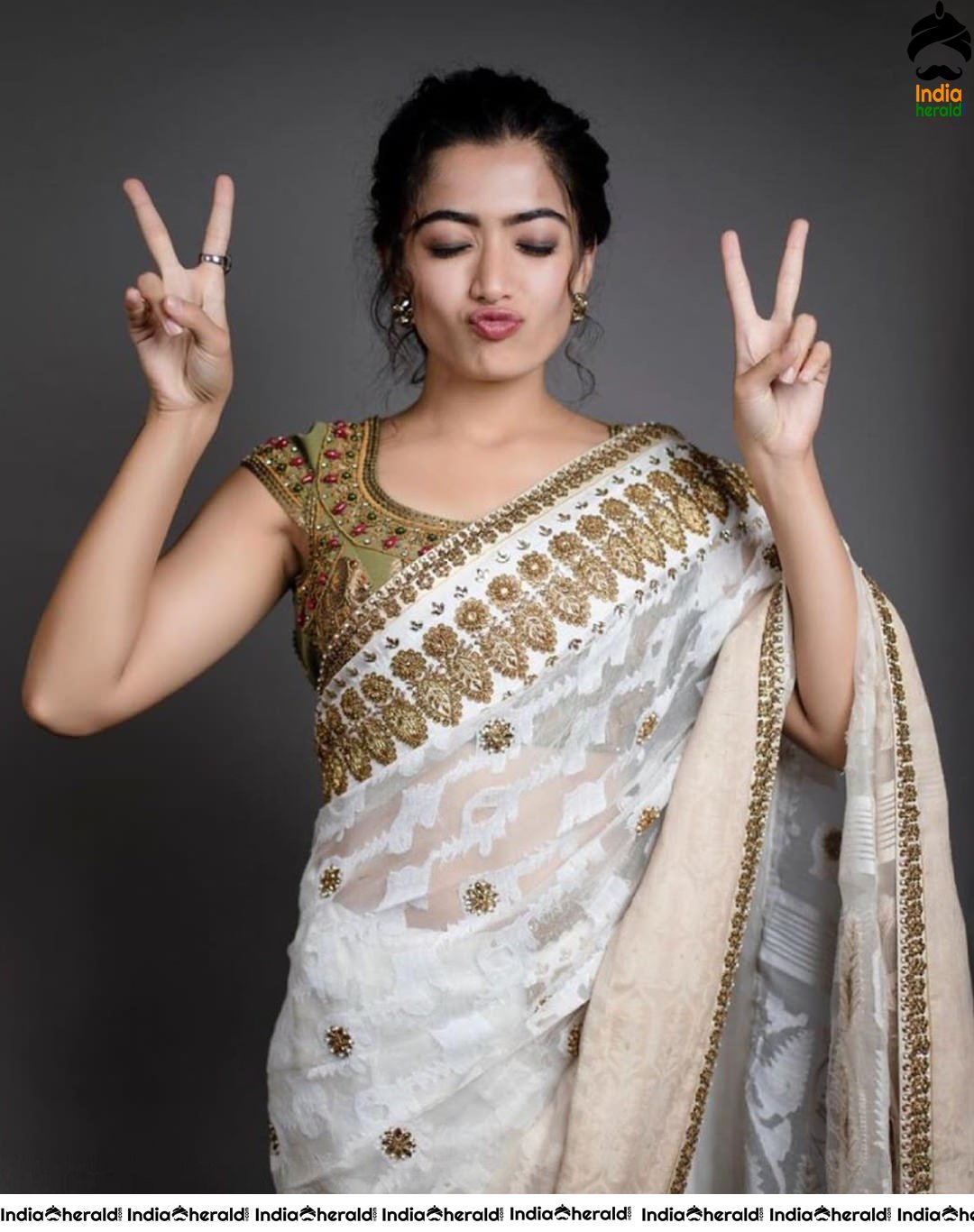 Rashmika Mandanna Cute Adorable Expressions in Saree