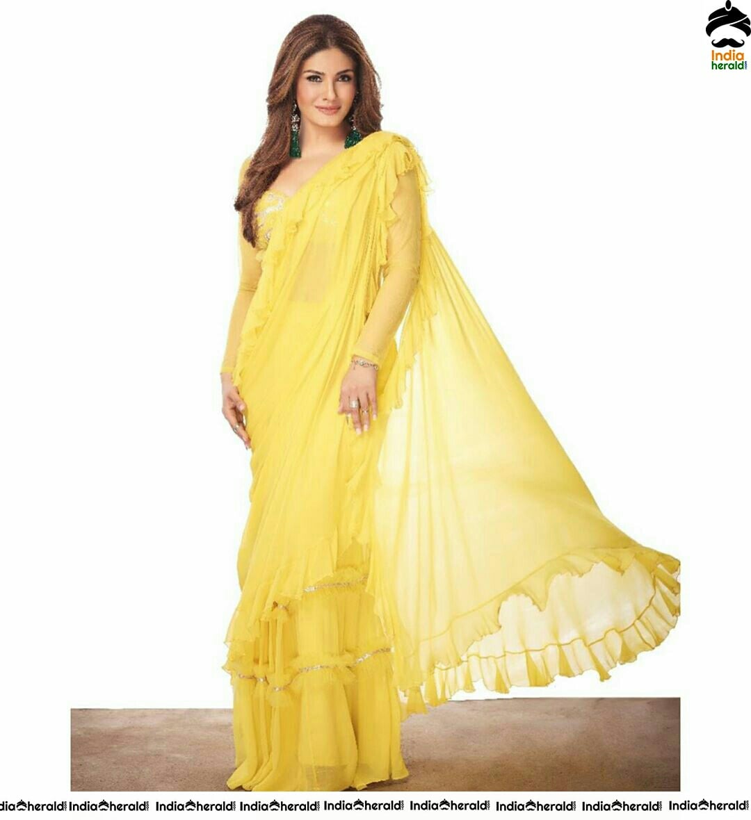 Raveena Tandon Hot In Yellow Saree Photoshoot