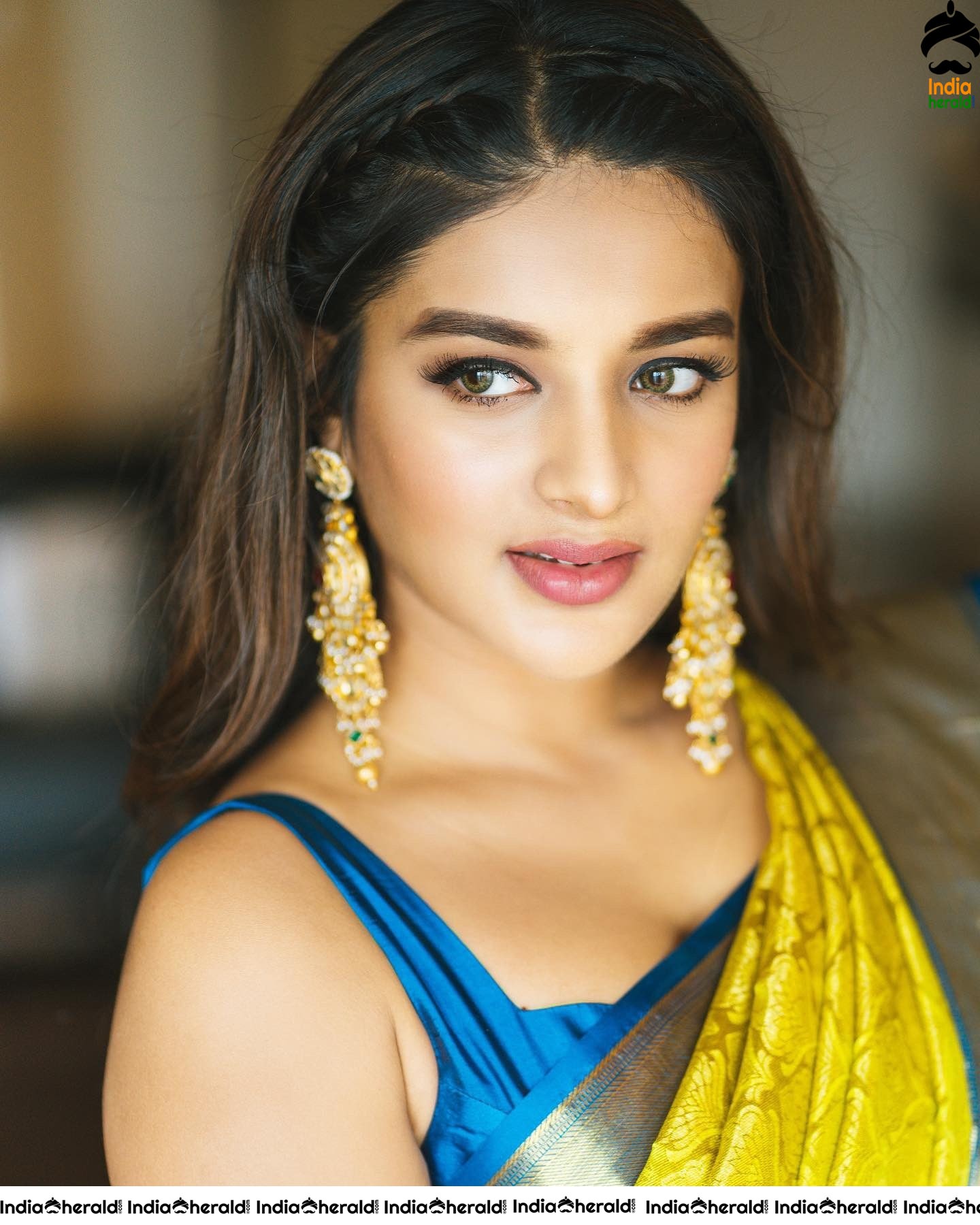 Recent Hot Clicks of Nidhhi Agerwal in Saree and Sleeveless Blouse