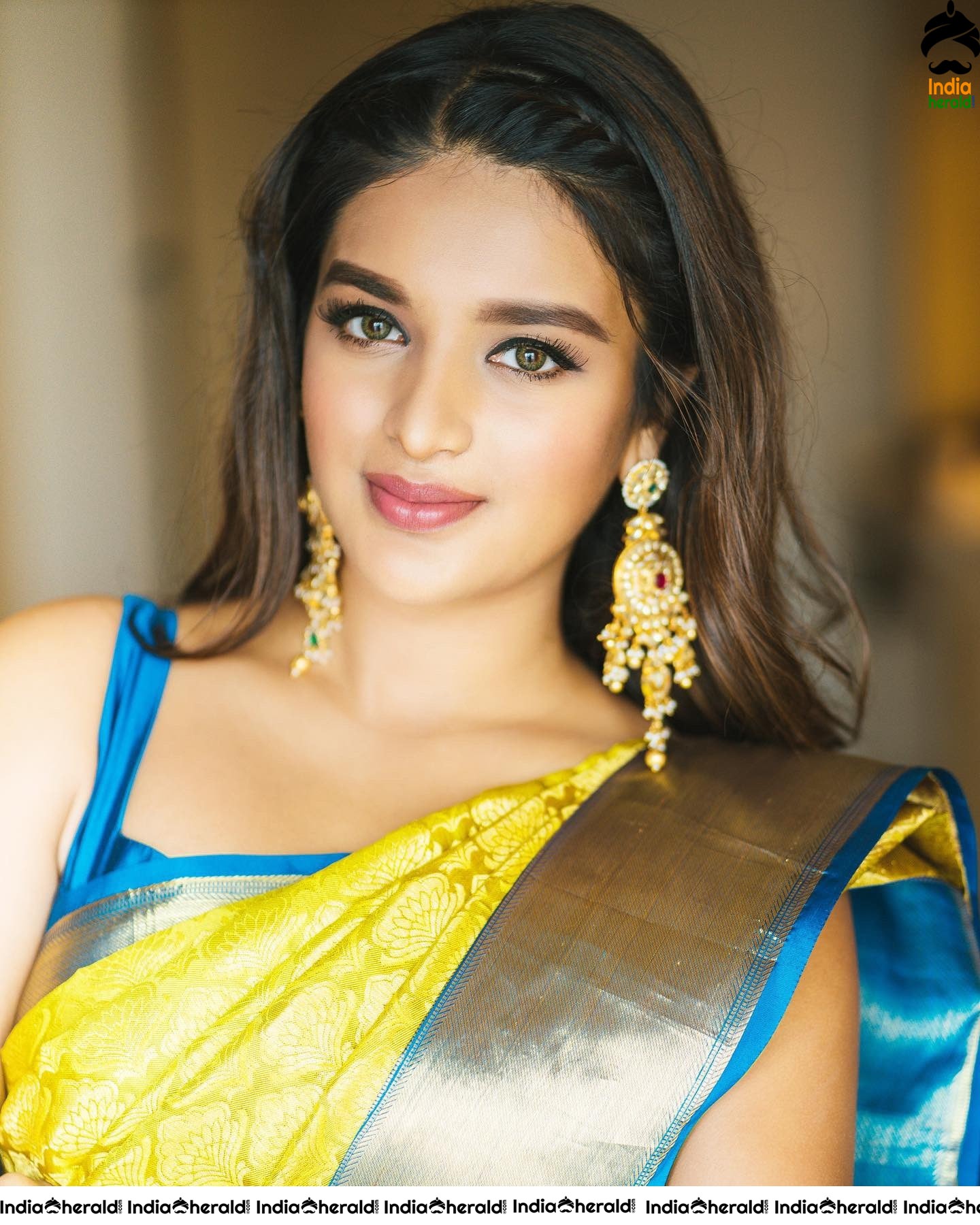 Recent Hot Clicks of Nidhhi Agerwal in Saree and Sleeveless Blouse
